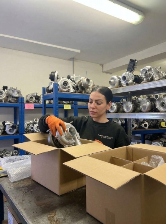 Technician packing turbocharger